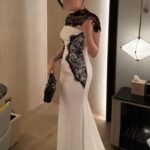 فستان مناسبات بتصميم أنثوي راقي بلمسات لامعة